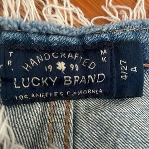 Distressed denim 100%cotton Lucky Brand ripped jeans